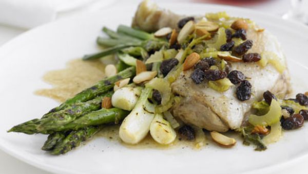 Pan-roasted chicken with sultanas, almonds and celery