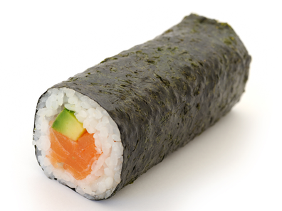 Salmon and avocado sushi roll stock image