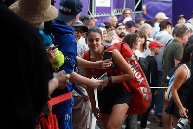 Emma Navarro of the USA makes selfies with fans after winning against Alize Cornet of France in their women's singles match during day two of the Internationaux de Strasbourg on May 20, 2024 in Strasbourg, France. 