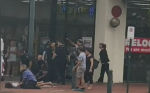 Two off-duty police, believed to be husband and wife, were seriously injured when they tried to help a security guard with a shoplifting matter at a Glenside shopping centre.