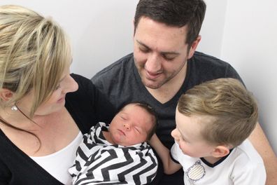 Scott and Shari Hogan with Porter and big brother Milan 