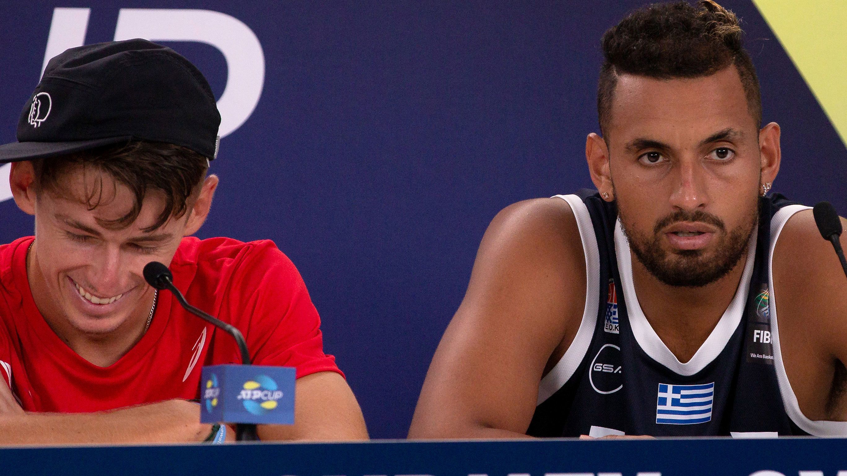 Alex de Minaur and Nick Kyrgios share the podium at the 2020 ATP Cup.
