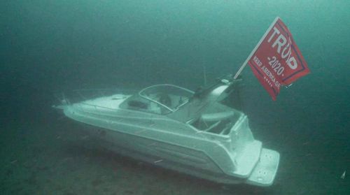 Several boats taking part in a Trump support parade on Lake Travis in Texas sunk on September 5. This photograph, with a fake Trump 2020 flag, began to circulate after.