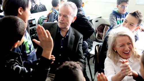 Labor leader Bill Shorten (left) and his wife Chloe visiting the UNRWA Aida Refugee Camp in Bethlehem in the occupied West Bank. (AAP)