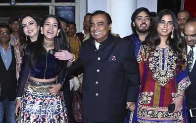 India's business tycoon Mukesh Ambani along with his wife Nita Ambani, daughter Isha Ambani and son Anant Ambani in 2018.