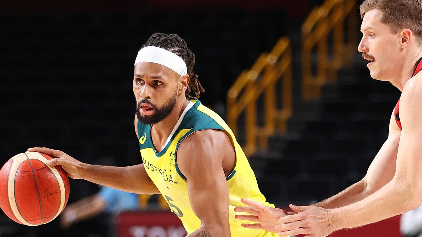 Patty Mills #5 of Team Australia drives to the basket against Germany during the first half of a Men&#x27;s Basketball Preliminary Round Group B game on day eight of the Tokyo 2020 Olympic Games at Saitama Super Arena on July 31, 2021 in Saitama, Japan. (Photo by Gregory Shamus/Getty Images)