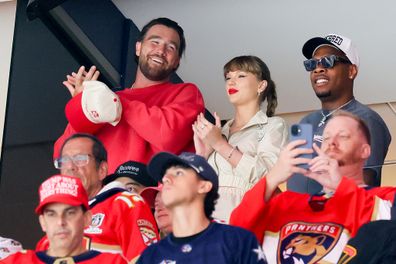 SUNRISE, FLORIDA - JUNE 12: Travis Kelce, left, and Taylor Swift react as the Edmonton Oilers and the Florida Panthers play during the first period in Game Four of the 2025 Stanley Cup Final at Amerant Bank Arena on June 12, 2025 in Sunrise, Florida. (Photo by Bruce Bennett/Getty Images)