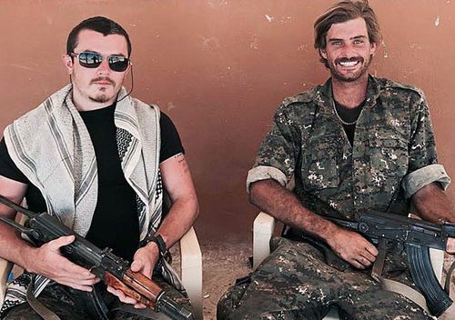 Queensland man Ashley Dyball (left), poses for a photograph with Reece Harding, who was killed fighting alongside Kurdish forces in Syria. (AAP)