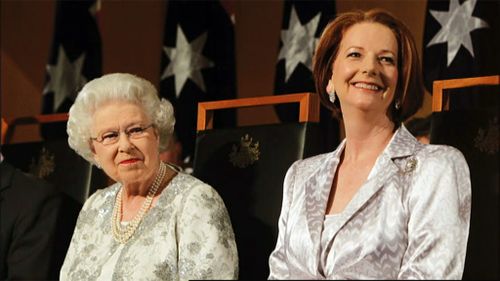 Gillard takes swipe at Abbott over Prince Philip knighthood