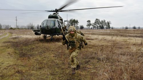The Ukrainian Air Assault Forces perform tactical drills in an unknown location in Ukraine