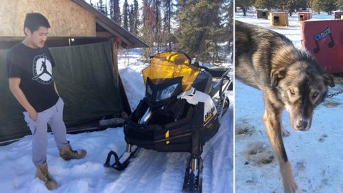 Nulato resident Arnold Demoski, 26, and one of the dogs he injured. (KTUU)