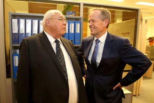 Laurie Oakes and Opposition leader Bill Shorten share a story at Laurie's farewell drinks.