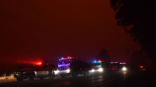 A Rural Fire Service strike team near a bushfire in North Nowra, 160km south of Sydney, Saturday, January 4, 2020