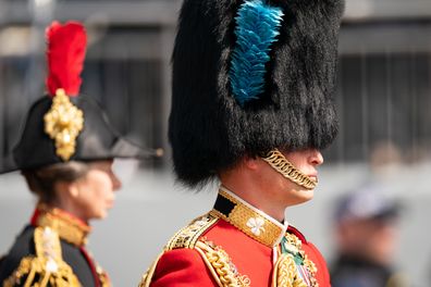 LONDON, ENGLAND - JUNE 02: Prince William, Duke of Cambridge, in his role as Colonel of the Irish Guards, rides his horse along the Mall during the Royal Procession ahead of the Trooping the Colour parade on June 2, 2022 in London, England. Trooping The Colour, also known as The Queen's Birthday Parade, is a military ceremony performed by regiments of the British Army that has taken place since the mid-17th century. It marks the official birthday of the British Sovereign. This year, from June 2 