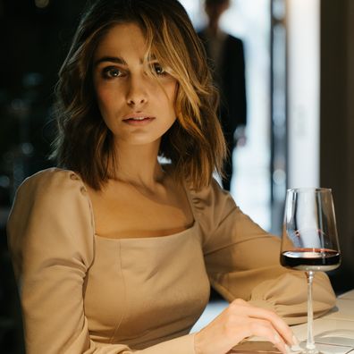 Woman with a glass of wine