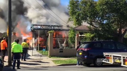 Fire destroyed a family home in Auburn, Sydney, today. (9NEWS)