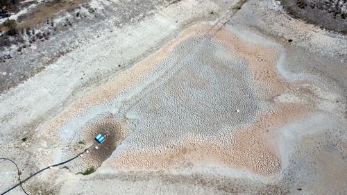 An aerial view of a dried up dam at Cottonvale apple orchard, outside of Stanthorpe.