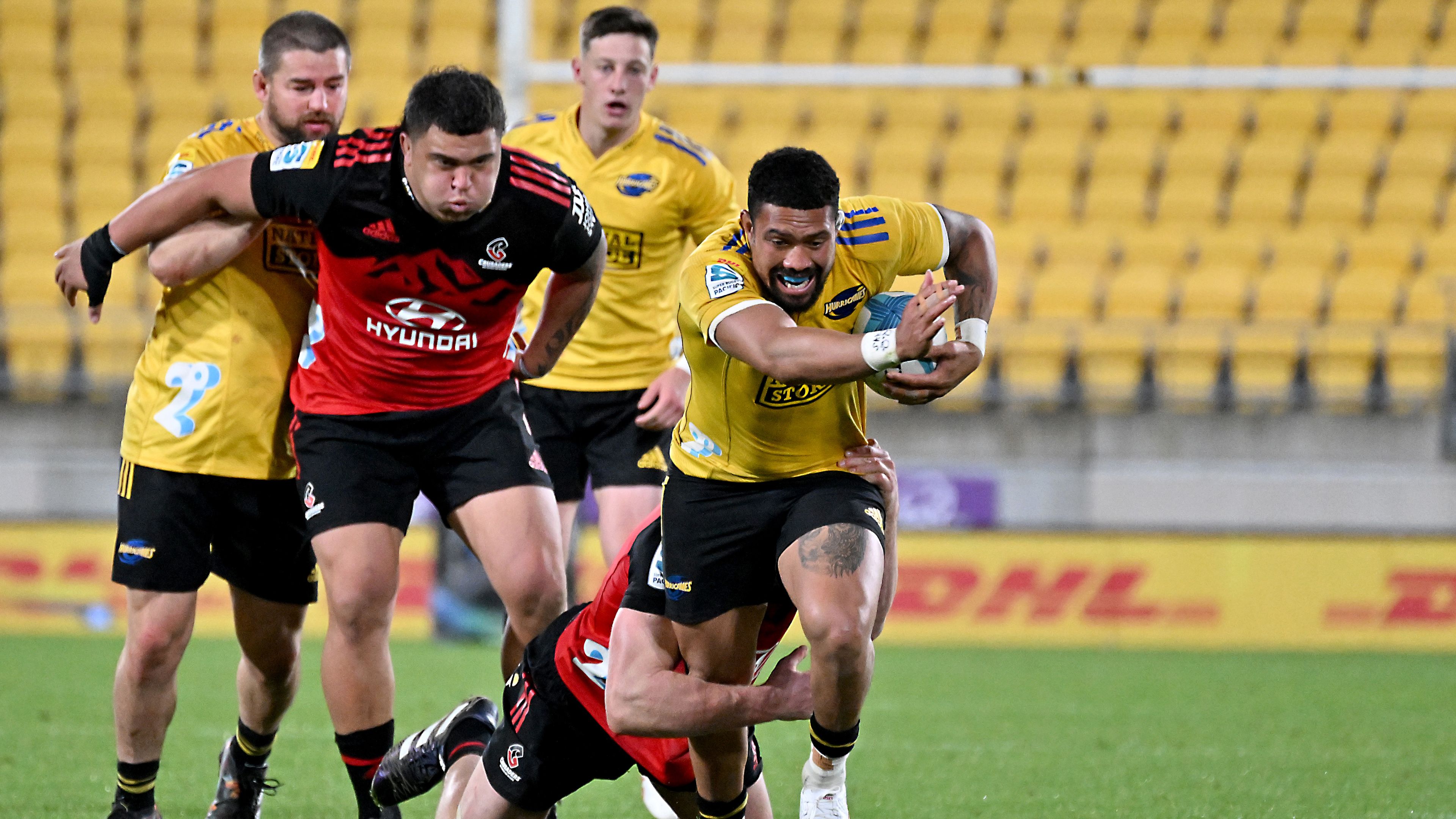 Ardie Savea of the Hurricanes runs with the ball.