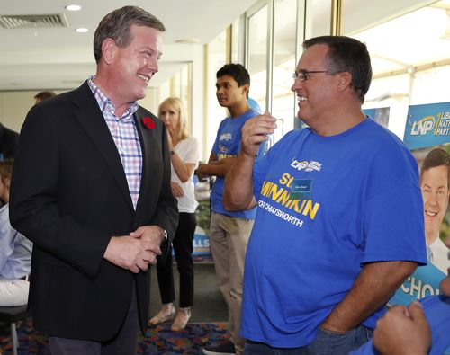 Queensland Opposition leader Tim Nicholls talks to a local resident at the campaign launch of Steve Minnikin, candidate for Chastworth. (AAP)