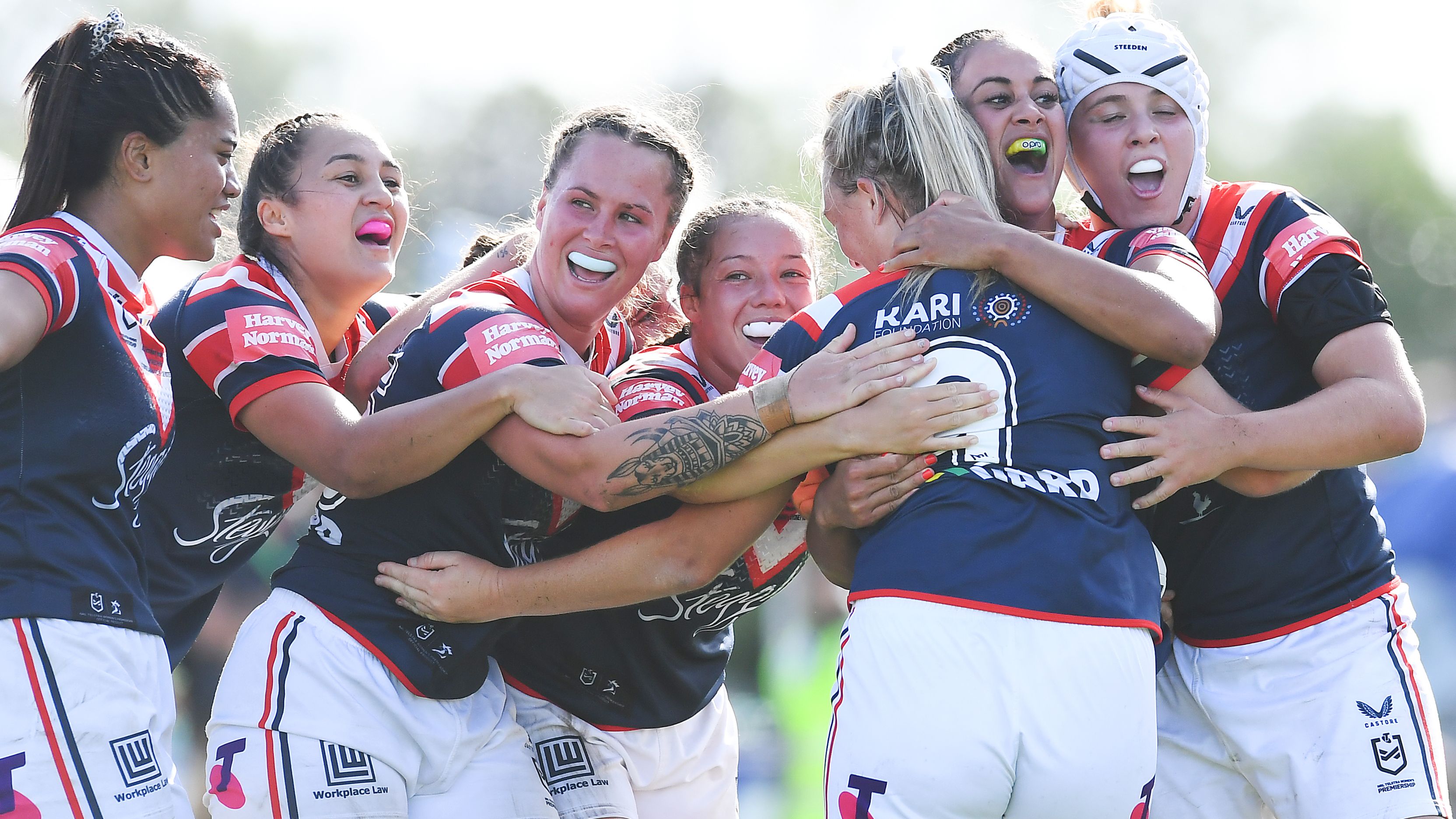Roosters celebrate a Olivia Higgins try during the NRLW grand final.
