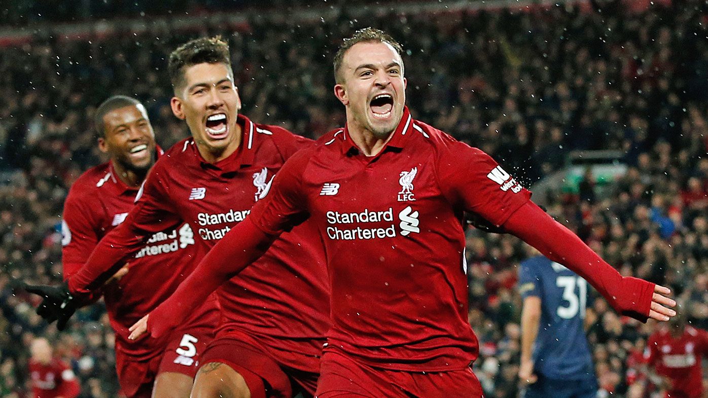 Liverpool sink Manchester United to reclaim top spot