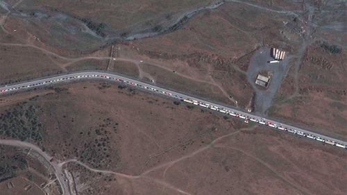 A traffic jam near the Russia border with Georgia formed from people desperate to leave the country.