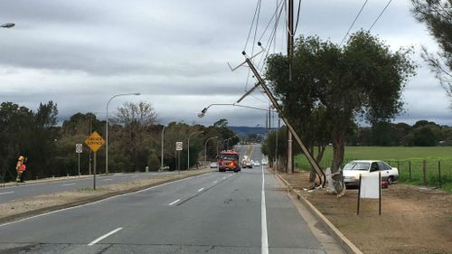 The Holden sedan crashed into the stobie pole on Grand Junction Road just after 1pm. (9News)