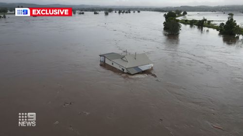 Sarah and Joshua Edge's home swept away in the NSW floods.