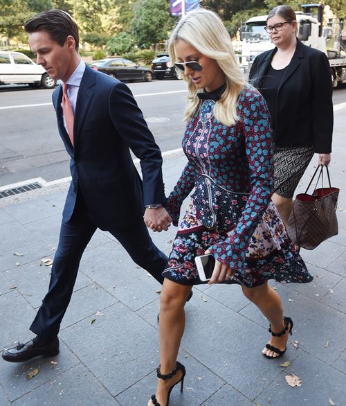 Stockbroker Oliver Curtis arrives with wife Roxy Jacenko at the Supreme Court of New South Wales during his trial in May.
