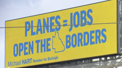 The billboard has been placed alongside a busy Gold Coast intersection.