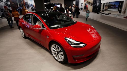 Tesla delivers Model 3 Standard Range Electric Vehicle for the masses