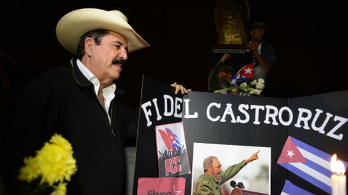Honduras' former president Manuel Zelaya pays tribute to the Cuban revolutionary leader. (AFP)