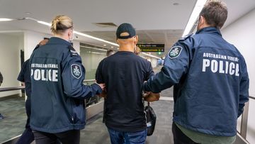 Chinese-British dual national extradited from Bangkok to Melbourne over alleged drug trafficking. 