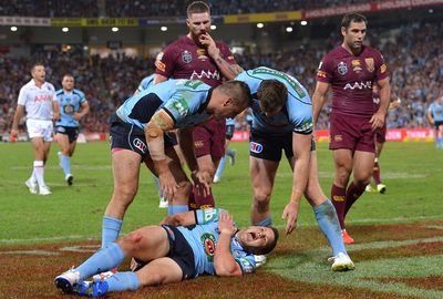 <b>Queensland and NSW as well as a host of NRL clubs have been left to count the cost of a brutal Origin opener. </b><br/><br/>Maroons halfback Cooper Cronk was the first star to suffer an injury after breaking his arm in the 10th minute, while skipper Cameron Smith sustained ankle ligament damage.<br/><br/>The Blues were not spared with Brett Morris dislocating his shoulder, brother, Josh, suffering a suspected knee ligament tear and captain Paul Gallen sustaining a neck injury. Anthony Watmough also suffered a suspected torn bicep. <br/><br/>Click through to re-live the brutality and the bravery of the fierce Origin opener. <br/><br/><br/><br/><br/>