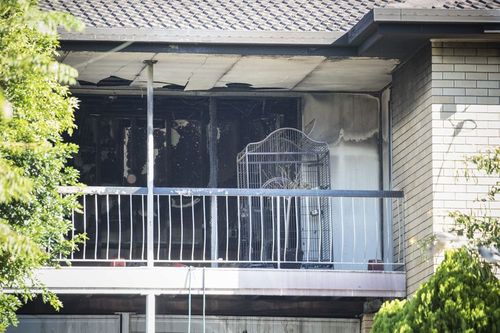 Neighbouring residents have told police they smelt fuel and heard strange noises from inside the house during the fire. (AAP)