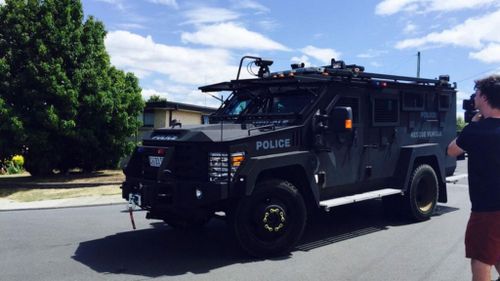 Tasmanian police negotiate with man refusing to leave house