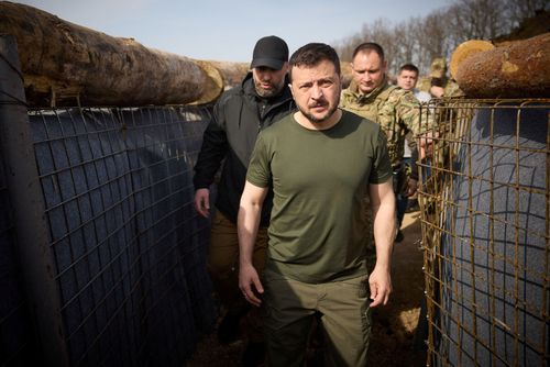 Ukraine's President Volodymyr Zelensky inspects new fortifications for Ukrainian servicemen near the Russian border in the Kharkiv region on Tuesday