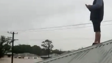 Family stranded on roof Casino Street Lismore Today help rescue in floods