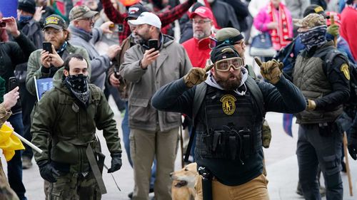 Rioters outside the US Capitol building.