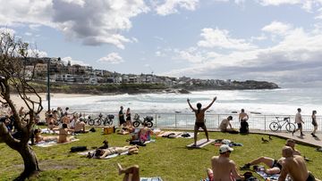 People enjoy the sunshine on the Labour Day long weekend public holiday at Bronte Beach, Sydney, Monday October 3, 2022. 