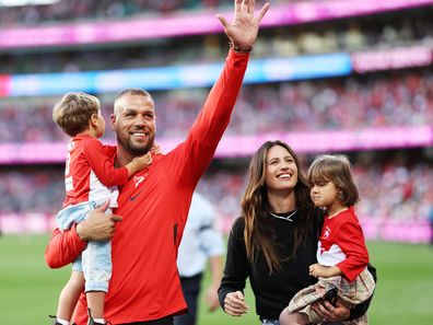 Lance Franklin of the Swans farewells the crowd with his wife Jesinta Franklin and children during a lap of honour during the round 24 AFL match between Sydney Swans and Melbourne Demons at Sydney Cricket Ground, on August 27, 2023