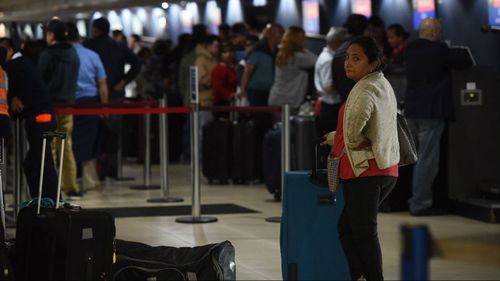 Airports are choked with people stranded in the country. (AAP)