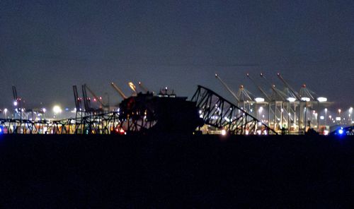 Parts of the Francis Scott Key Bridge remain after a container ship collided with a support Tuesday, March 26, 2024 in Baltimore. 