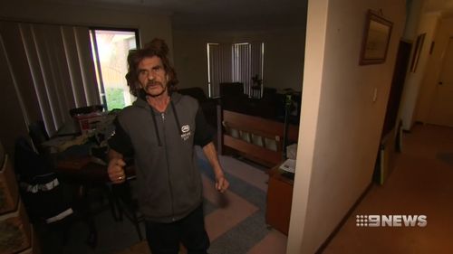 A brave grandfather has fought off an armed intruder in a frightening home invasion in Perth's north-east.