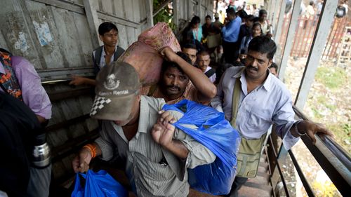 Stampede at Indian train station kills at least 22