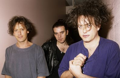 AUSTRALIA - AUGUST 01:  Photo of Robert SMITH and Simon GALLUP and Perry BAMONTE and CURE; L-R: Perry Bamonte, Simon Gallup, Robert Smith - posed  (Photo by Bob King/Redferns)