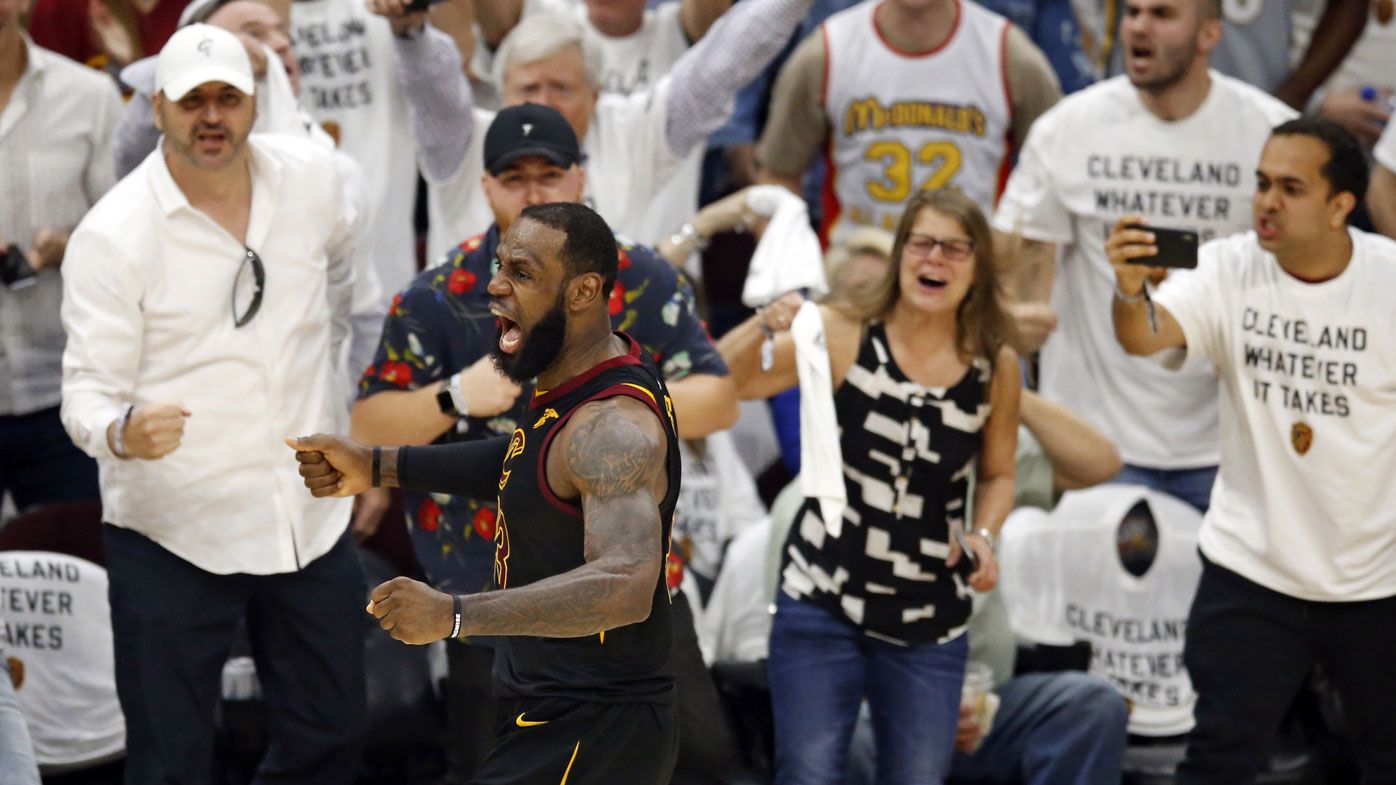 LeBron dominates Celtics to stay alive