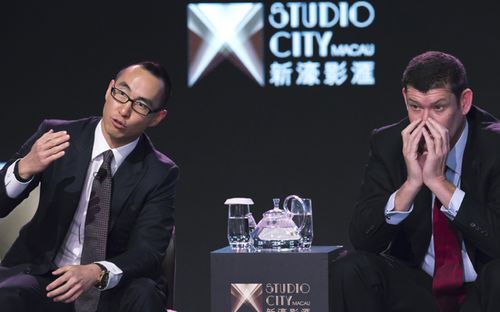 Melco Crown Entertainment co-chairman and chief executive officer Lawrence Ho, left, speaks in 2015 as co-chairman James Packer listens during a news conference about the Studio City project in Macau.