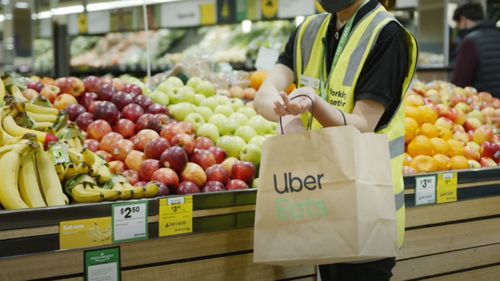 Woolworths and Uber Eats have teamed up promising to deliver fresh groceries in an hour.