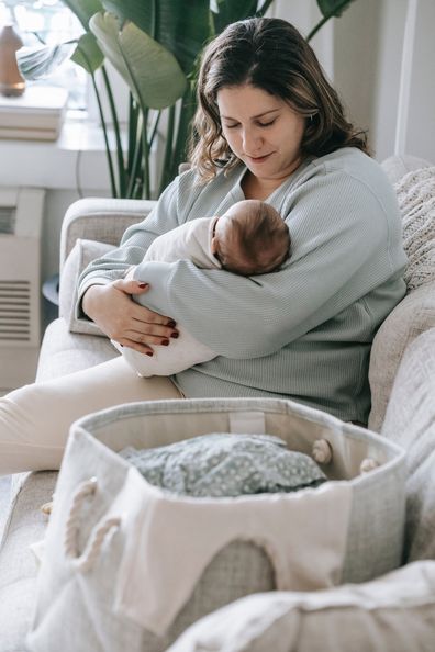 A woman with her baby. Stock image.
